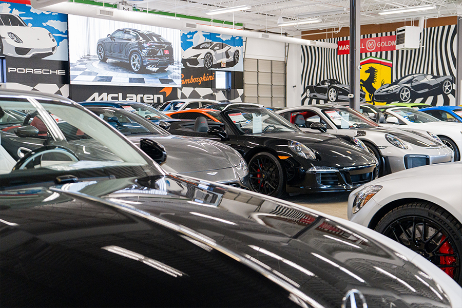 Close up of a person holding keys over a customers hand