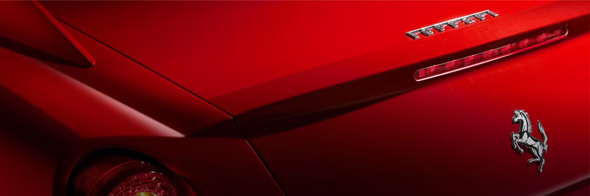 Detailed rear end shot of a Ferrari vehicle with logo
