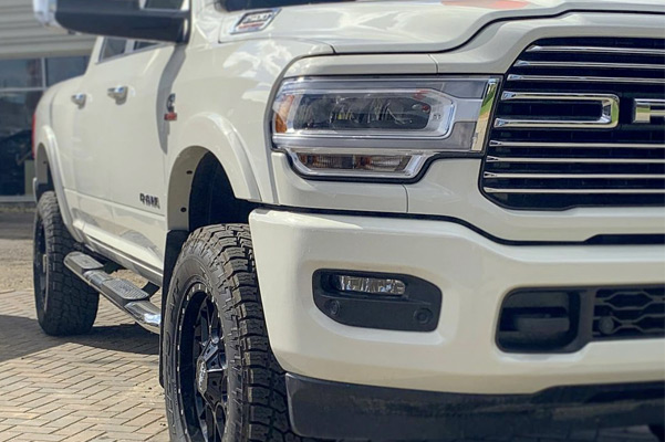 close up of white ram truck