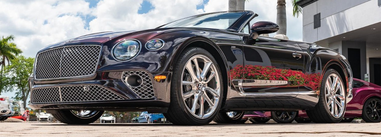 Luxury convetible parked outside the dealership
