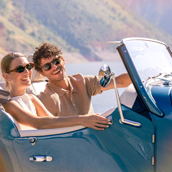 2026 Morgan Plus Four with couple on the car