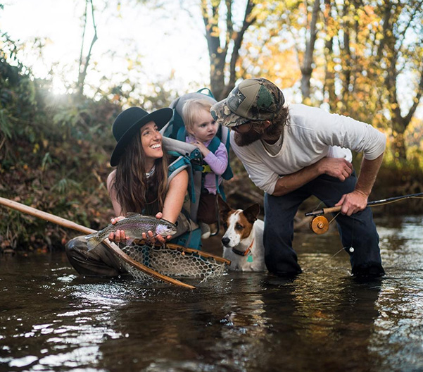 Family and dog fishing