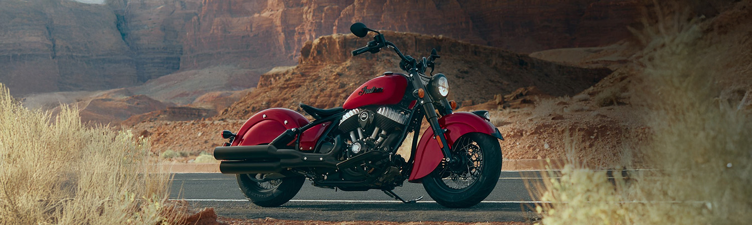 Side shot of Indian Motorcycle parked on side of road