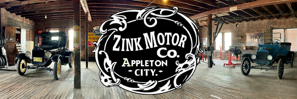 Zink Motor Co logo showcasing antique cars.